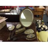 A brass mounted dressing table set.