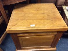 A satinwood commode.