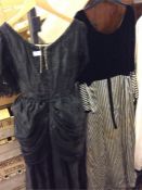 A mourning gown together with another stripey dres