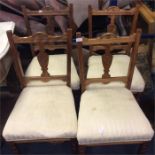 A set of four Edwardian chairs.