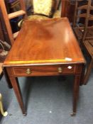 A Georgian cross banded Sutherland table.