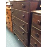 A mahogany chest of five drawers.