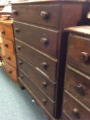 A mahogany chest of five drawers.