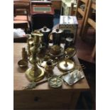 A collection of brassware.