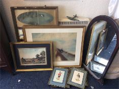 A collection of prints, mirror etc.