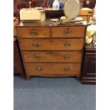 A mahogany five drawer chest.