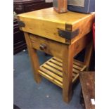 A good butchers block on stand.