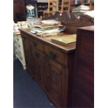 A stylish oak panelled sideboard.