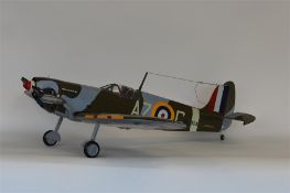A large model of a Spitfire aircraft with outstret