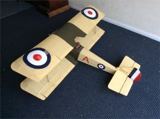 A large model of a Sopwith Pup aircraft.