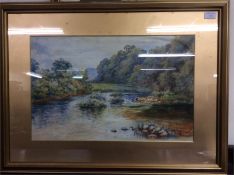 A framed and glazed watercolour of a river scene.