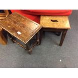 A coffin stool together with one other.