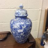 A Chinese blue and white vase and cover. (Slight d