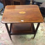 An Edwardian inlaid table.