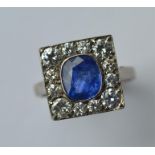 A large rectangular sapphire and diamond cluster r