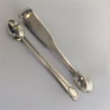 A pair of Georgian bright cut tongs together with