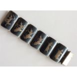 A good quality enamelled bracelet of dancing scene