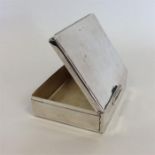 An unusual silver hinged sandwich box with carryin