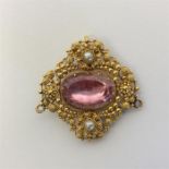 An Antique topaz and pearl pendant in high carat g
