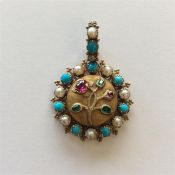 A good Antique turquoise, ruby and emerald pendant