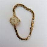 A Tudor Royal lady's wristwatch in 9 carat gold. A