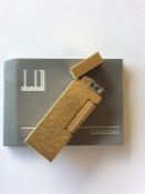 DUNHILL: A boxed gold plated lighter complete with
