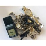 A box containing numerous lady's wristwatches, cha