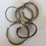 A heavy group of five silver torque bangles. Appro