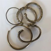 A heavy group of five silver torque bangles. Appro