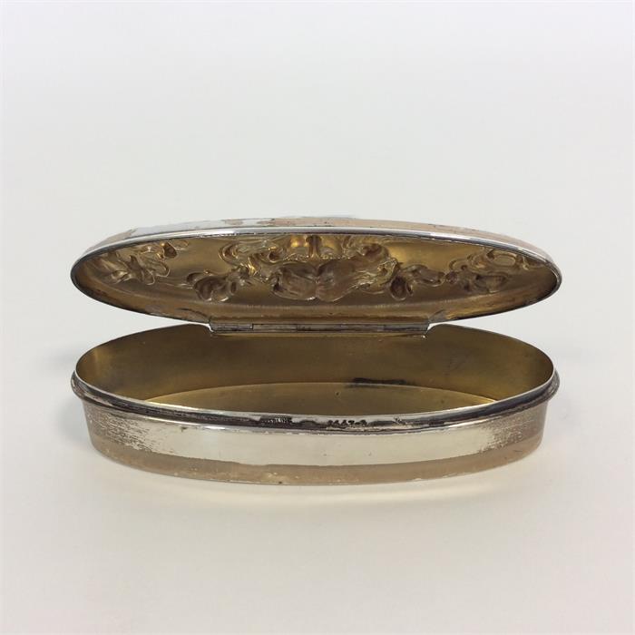 An oval sterling embossed top pin box decorated wi - Image 2 of 2