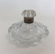 A good tapered scent bottle with cut glass mounts.