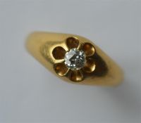 A heavy gent's 18 carat single stone diamond ring
