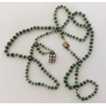A Georgian string of emerald and pearl beads with