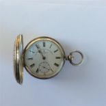 An attractively engraved large silver pocket watch