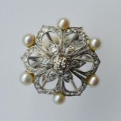 An 18 carat large pearl and diamond cluster ring i