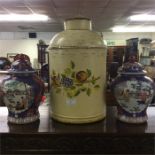 A pair of pottery vases together with a ewer.