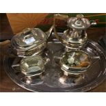 A large plated tea service on tray.