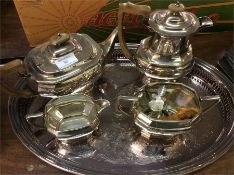 A large plated tea service on tray.