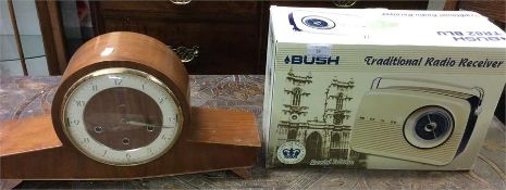 A Bush radio and a clock.