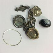 Silver brooches, medallions etc.