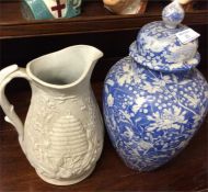 An ironstone jug together with an Oriental vase.