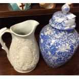 An ironstone jug together with an Oriental vase.