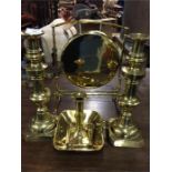 A large pair of brass candlesticks together with a