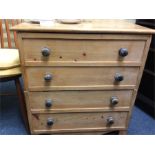 A pine hinged top commode.