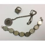 A silver coin necklace together with matching ring