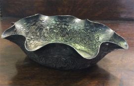An Eastern oval Indian wavy edged dish.