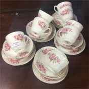 A decorative bone china floral tea service.