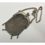 A small silver mesh purse.