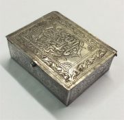 A small silver Eastern box.