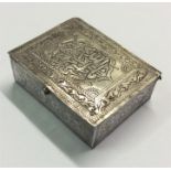 A small silver Eastern box.